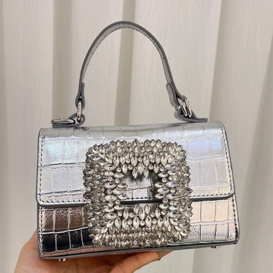Bolsa de fiesta con broche de cristales