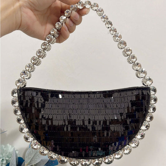 Bolsa de fiesta en lentejuelas con asa de cristales