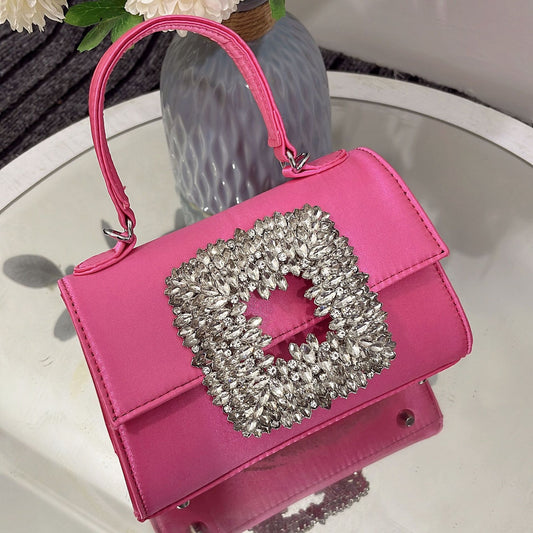 Bolsa de fiesta en satín con broche de cristales
